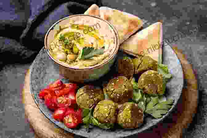 A Bowl Of Hummus With Pita Bread And Vegetables Vegetarian Heartland: Recipes For Life S Adventures