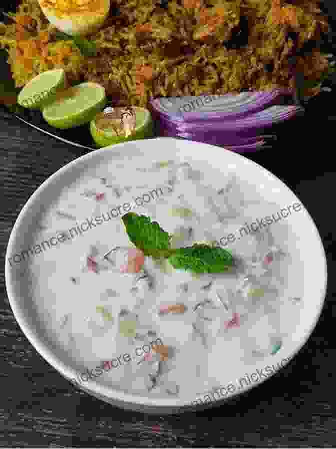 A Cooling And Refreshing Indian Raita Salad, Featuring Fresh Yogurt, Chopped Vegetables, And A Delicate Blend Of Spices THE OF SALADS FROM DIFFERENT COUNTRIES