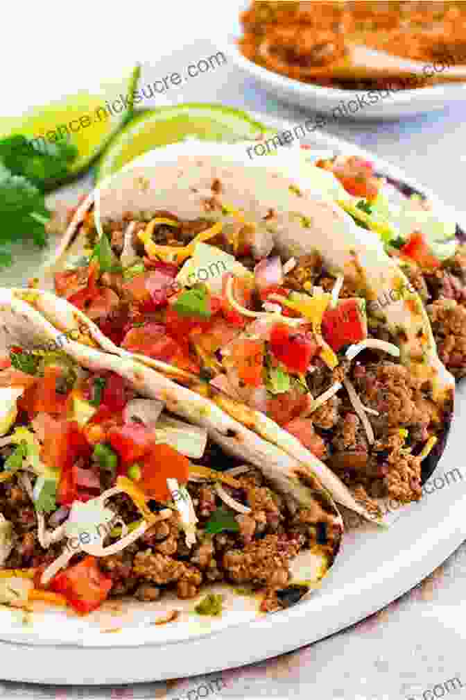 A Plate Of Tacos With Ground Beef, Lettuce, Tomato, Onion, And Cheese Ultimate Ground Beef Cookbook: Timeless Classic And Delicious Meals For Everyday (Southern Cooking Recipes)