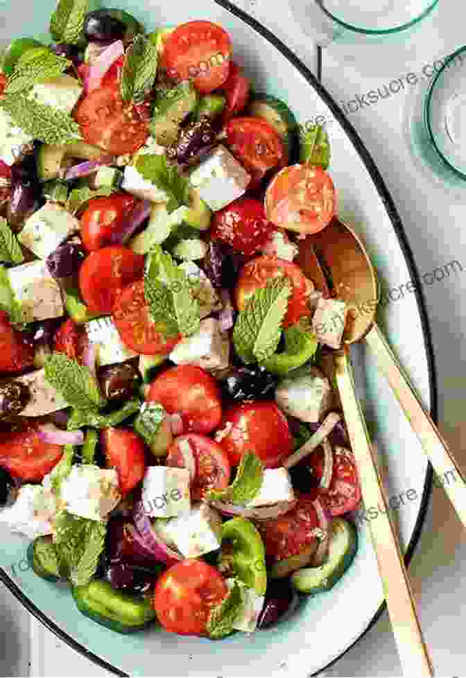 A Vibrant Greek Salad, Featuring Fresh Cucumbers, Tomatoes, Onions, Feta Cheese, And Olives, Tossed In A Tangy Olive Oil Dressing THE OF SALADS FROM DIFFERENT COUNTRIES